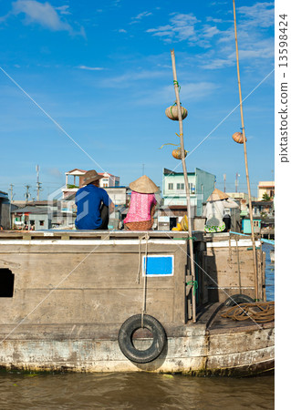 Boats in a harbor in the Mekong delta, Can Tho, Vietnam 13598424