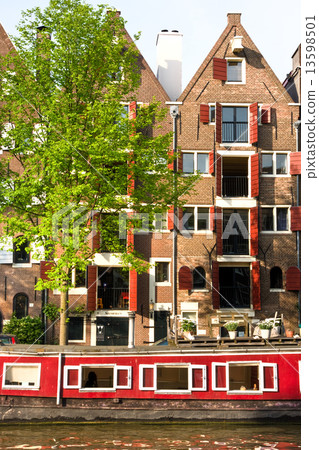Amsterdam, Canal and houseboat 13598501