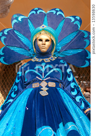 VENICE - MARCH 05: Participant in The Carnival of Venice, an ann 13598630