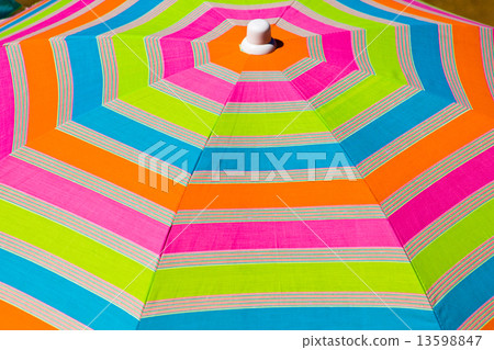 Colorful umbrella on the beach Colorful umbrella on the beach 13598847
