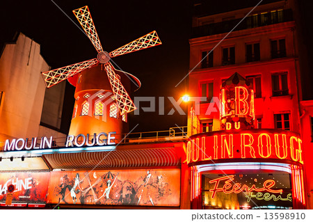 PARIS - DECEMBER 10: The Moulin Rouge by night, on December 10, 13598910