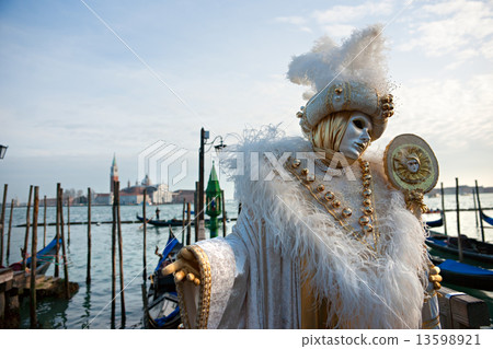 VENICE - MARCH 05: Participant in The Carnival of Venice, an ann 13598921