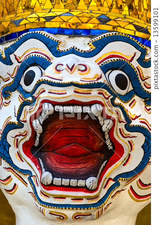 Warrior face at Wat Phra Kaeo Temple, Thailand.. Warrior face at Wat Phra Kaeo Temple, Thailand.. 13599101