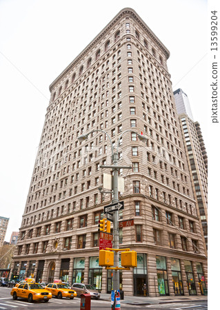 NEW YORK -MARCH 29: Flat Iron building facade on March 29, 2011. NEW YORK -MARCH 29: Flat Iron building facade on March 29, 2011. 13599204