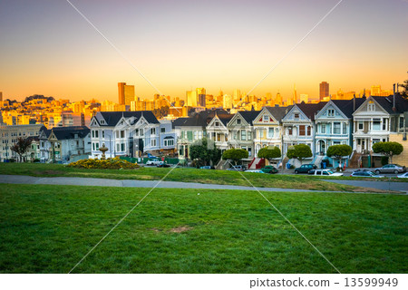 The Painted Ladies of San Francisco, California sit glowing amid The Painted Ladies of San Francisco, California sit glowing amid 13599949