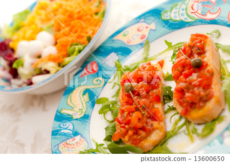 Mix Salad with tomato bruschetta on background. 13600650