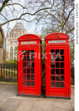 Two red telephone box outside the natural history museum. London Two red telephone box outside the natural history museum. London 13601509