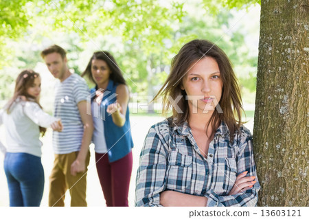 Lonely student being bullied by her peers Lonely student being bullied by her peers 13603121