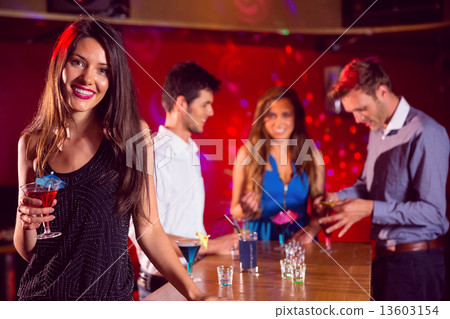 Happy friends on a night out together Happy friends on a night out together 13603154