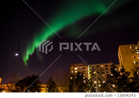 Aurora borealis over city buildings Aurora borealis over city buildings 13604243