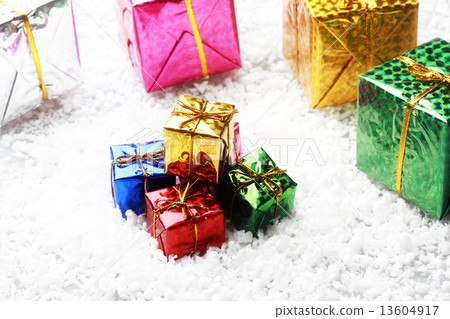 The small gift box group on snow for decoration christmas 13604917