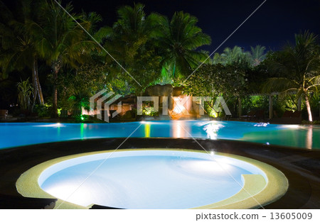 Pool and waterfall at night 13605009