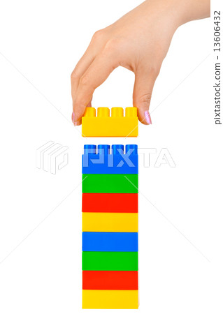 Hand and toy tower Hand and toy tower 13606432