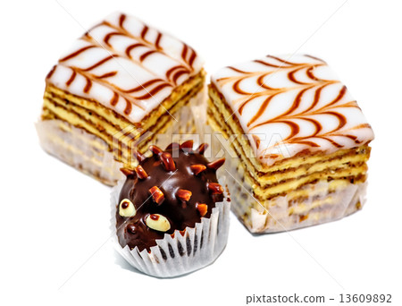 Layered cakes and chocolate hedgehog isolated 13609892