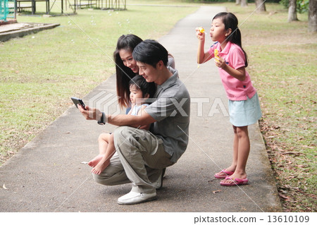 Family in the Park Family in the Park 13610109