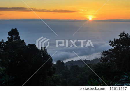 Colorful sunrise above the clouds Colorful sunrise above the clouds 13611257