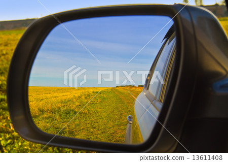 Looking Out Car Window with Reflection in Side Mirror Looking Out Car Window with Reflection in Side Mirror 13611408