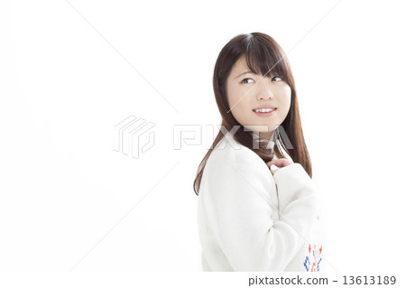 A cute girl in a white sweater A cute girl in a white sweater 13613189