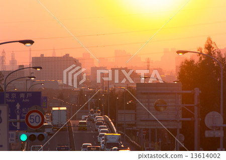 Car running toward sunset Car running toward sunset 13614002