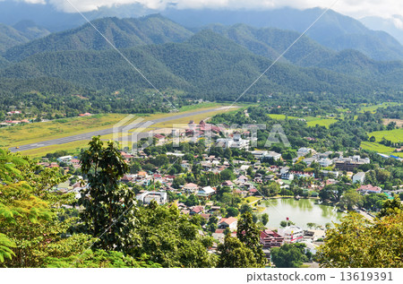 Landscape high angle view of the city in the valley. Landscape high angle view of the city in the valley. 13619391