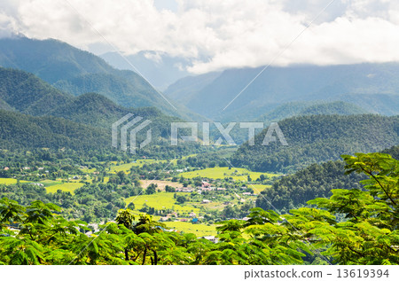Landscape high angle view of the city in the valley. Landscape high angle view of the city in the valley. 13619394