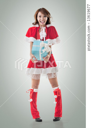 Christmas girl hold gift box 13619677