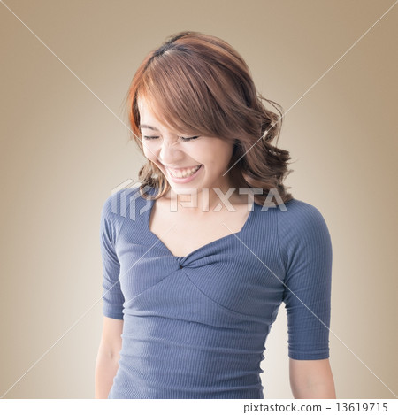 Shy Asian girl smiling 13619715
