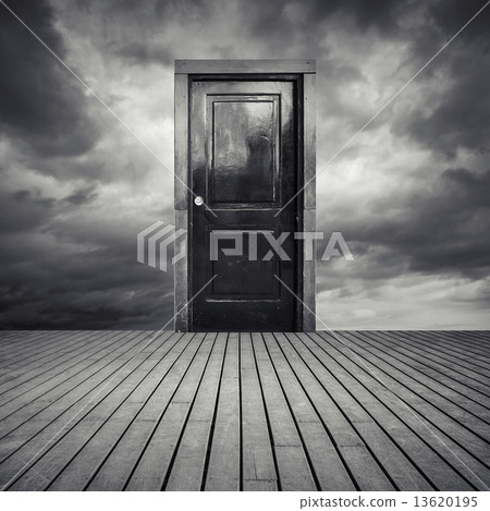 Abstract interior concept with black door and dramatic sky 13620195