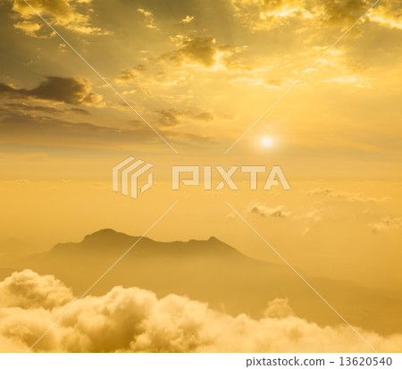 Mountains in cloud on sunset 13620540