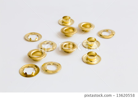 Rivets on a light background. 13620558