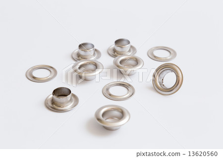 Rivets on a light background. 13620560