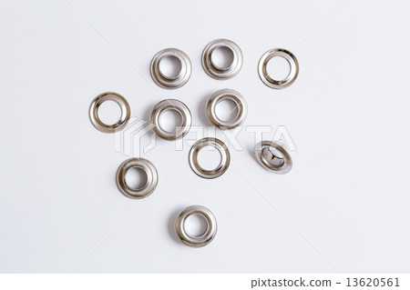 Rivets on a light background. 13620561