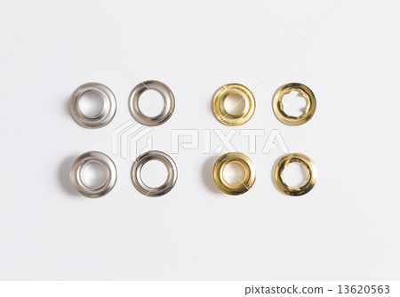 Rivets on a light background. 13620563