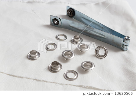 Rivets on a light background. 13620566