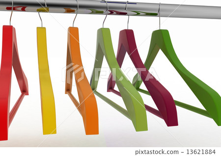 Row of color coat hangers on metal clothes rail 13621884