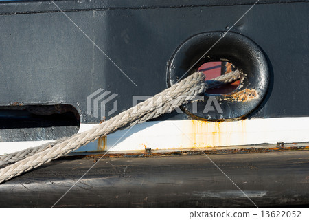 Ropes Tying a Ship to the Dock in Port 13622052