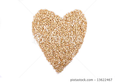 buckwheat groats in shape heart Isolated on white background 13622467