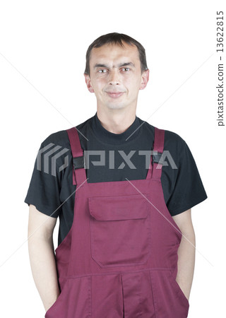 Young worker in overalls Young worker in overalls 13622815