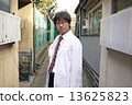 Researcher in a downtown 13625823