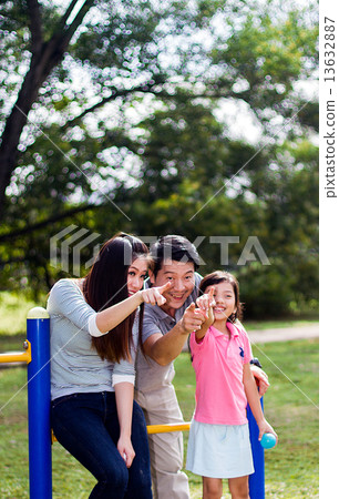 Asian Family in the Park 13632887