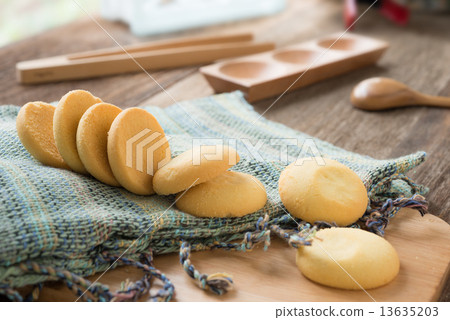 Cookies on Woven fabric on wooden tray 13635203