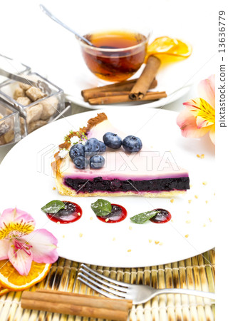 piece of blueberry pie on a table in a restaurant piece of blueberry pie on a table in a restaurant 13636779