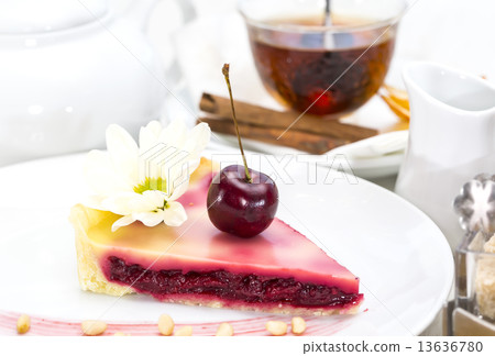 piece of cherry pie on a table in a restaurant piece of cherry pie on a table in a restaurant 13636780