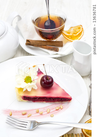 piece of cherry pie on a table in a restaurant piece of cherry pie on a table in a restaurant 13636781