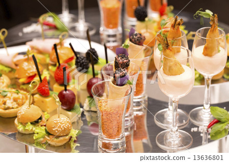 Canapes of cheese vegetables meat and seafood on white background Canapes of cheese vegetables meat and seafood on white background 13636801