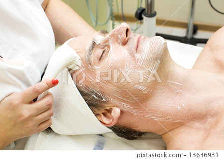 man in a beauty salon facial and massage man in a beauty salon facial and massage 13636931
