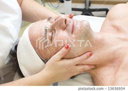 man in a beauty salon facial and massage man in a beauty salon facial and massage 13636934