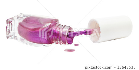 bottle and spilled purple nail polish isolated 13645533