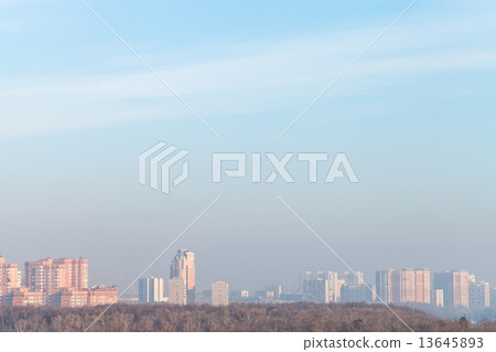 cold sunrise over city in winter 13645893