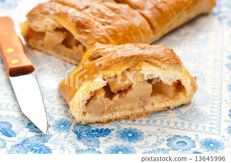 slice of an apple strudel on the table slice of an apple strudel on the table 13645996